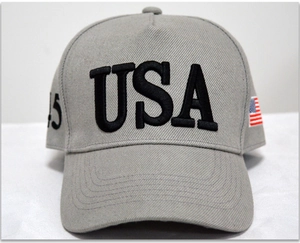 Detailed embroidery of USA letters and number 45 on a gray cotton baseball cap