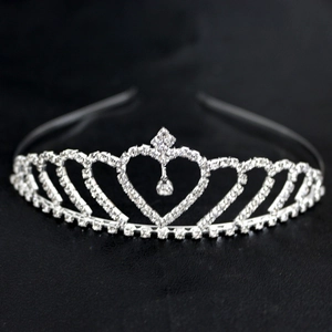 Detailed view of a silver princess crown headband with heart-shaped sparkling rhinestones