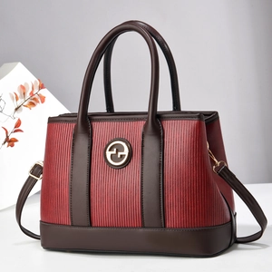 Retro burgundy and brown leather tote bag with vertical stripes and metal buckle