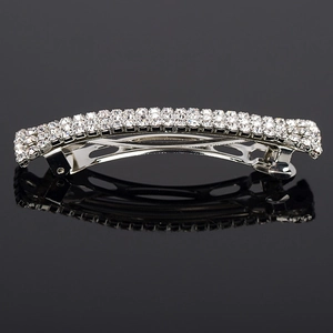 Sparkling silver alloy headband with four rows of clear rhinestones on black background