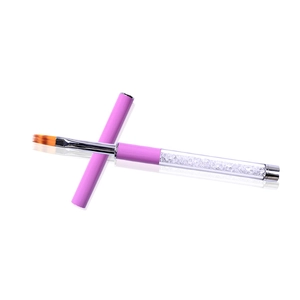 Professional pink nail art brush with sparkling diamond handle and flat gradient bristles