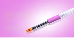 Macro detail of purple professional nail art ombre brush with zigzag bristles and rhinestones