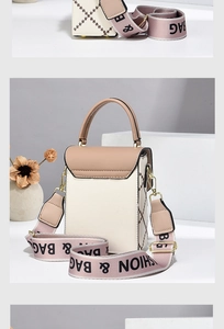 Detail view of stylish color-block PU leather bag with diamond lattice stitching and wide strap