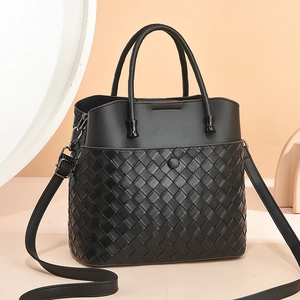 Elegant black handbag with woven texture and dual handles for daily commuter style