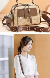 Detail van vintage schoudertas voor dames met een verstelbare brede jacquard riem