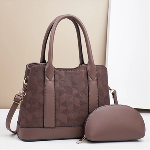 Brown geometric jacquard tote bag set with matching small pouch and gold hardware