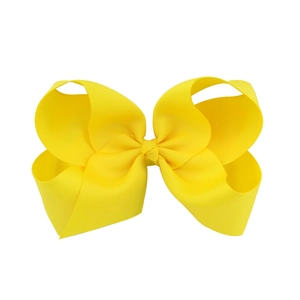 Vibrant yellow 6-inch grosgrain ribbon bow hair clip for girls with a textured finish