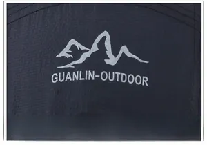 Close-up of quick-dry hat fabric with ripstop texture and mountain logo embroidery