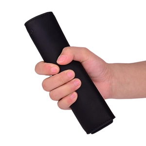 Slim black long wallet for men in stylish PU leather held in hand, minimalist business style