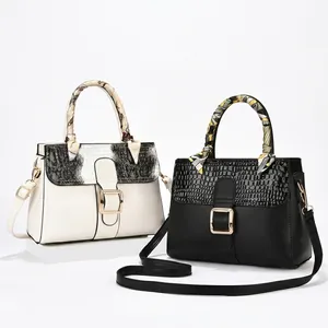 Détails de sacs à main à motif crocodile avec poignées en foulard de soie et boucle dorée