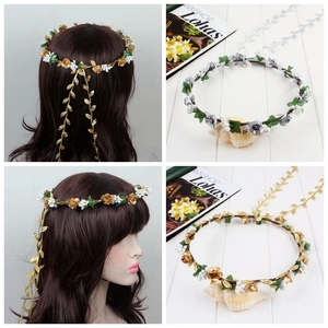 Detail of floral headband with cascading leaf vines in gold and silver finish