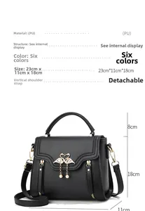 Detail of black lychee texture PU leather handbag with golden swan buckle and dimensions