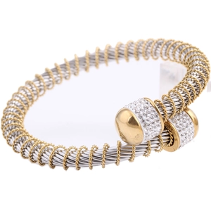 Detail of two-tone steel cable bracelet with gold accents and sparkling crystal charms