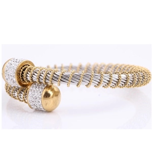 Elegant two-tone twisted cable bangle with crystal pave cylinders in gold and silver