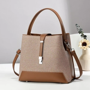 Sac à main élégant en toile avec finitions en cuir marron et boucle en métal argenté