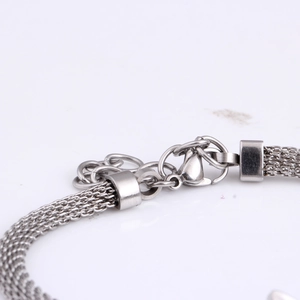 Silver cable chain bracelet with crystal butterfly pendant and lobster clasp closure