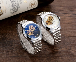 Detailed macro view showing the automatic movement and hollow skeleton dial of the watch