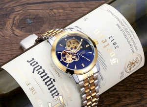 Macro detail of automatic mechanical watch movement through a blue skeleton dial