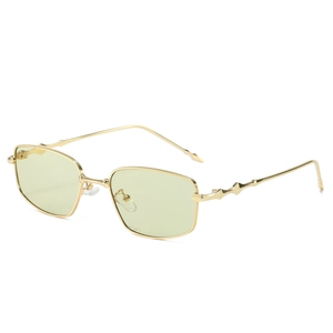 Vintage gold square sunglasses with light green lenses and star-pattern metal temples