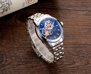 Macro view of skeleton mechanical watch dial with blue face and golden gears
