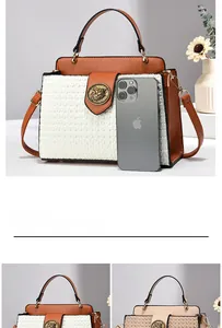 Detail shot of woven shoulder bag with brown leather trim next to a smartphone for size scale