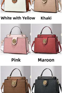 Detail showing woven leather texture and embossed lion head metal buckle on handbags