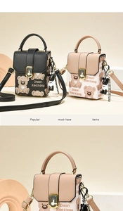 Detail of trendy crossbody bags with cute bear pattern and luxury metal lock buckle