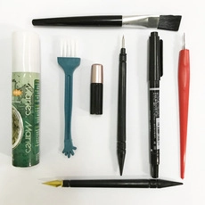 Professional scratch art tool set with brushes, detailing pens and cleaning accessories