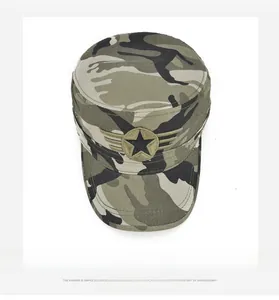 Close-up of military flat top cap in jungle camouflage with winged star emblem