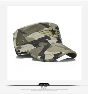 Detail of camouflage military flat top cap featuring a black star patch and metal eyelets