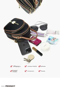Spacious three-layer mini backpack storage displaying phone camera and cosmetics