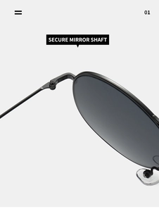 Close-up of the secure mirror shaft and metal hinge on vintage aviator sunglasses