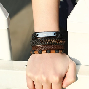 Men's leather bracelet set with volcanic stone beads and woven cross charms