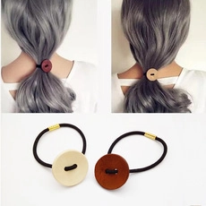 Dettagli di elastici per capelli camelia in beige e marrone effetto legno