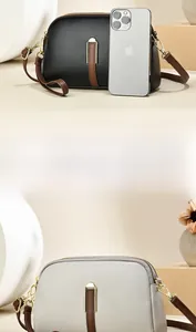 Size comparison of cross-body shell bags with smartphone showing scale and texture