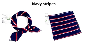 Detail of navy blue square scarf showing knotted style and navy red white stripe pattern