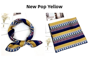 Detailed view of square silk scarf in New Pop Yellow featuring geometric pop art patterns