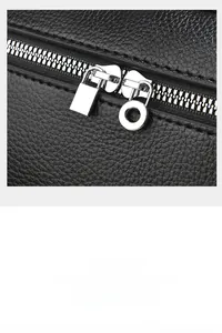 Close-up of premium lychee texture leather with durable silver-tone metal zipper hardware