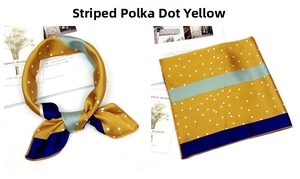 Detail of yellow silk scarf with white polka dots, grey stripes and dark blue edges
