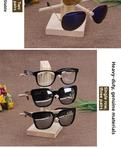 Detail view of single row 3-tier solid wood eyewear display stand for sunglasses
