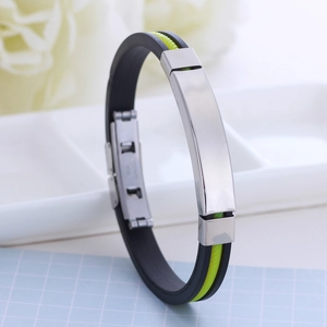 Black and neon green silicone bracelet with polished silver metal plaque and clasp