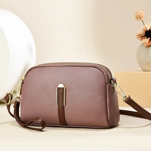 Stijlvolle lila crossbodytas van leer met litchi-textuur en dubbele gouden ritsen