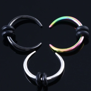 Detailed view of C-shaped stainless steel nose rings in black, silver, and rainbow finishes
