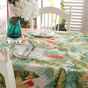 Thick cotton canvas tablecloth featuring tropical rainforest banana leaf and flower patterns