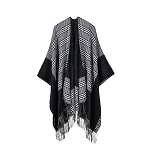 Thick black and white checkered oversized shawl with fringe detail for autumn and winter