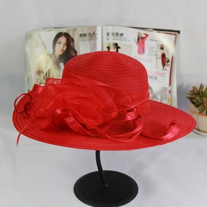 Elegant red organza wide-brim sun hat with decorative floral ribbon for formal occasions