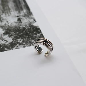 Detailed view of vintage S925 silver open ring with multi-layer twisted rope texture