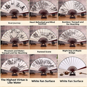 Collection of nine Chinese folding fans featuring calligraphy and landscape paintings on wood
