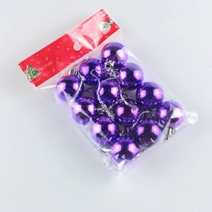 Detailed view of 12 purple glossy Christmas ornaments in clear retail packaging with silver caps