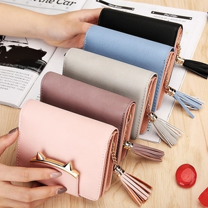 Short PU leather women's wallet featuring cute cat ears metal buckle and tassel charm
